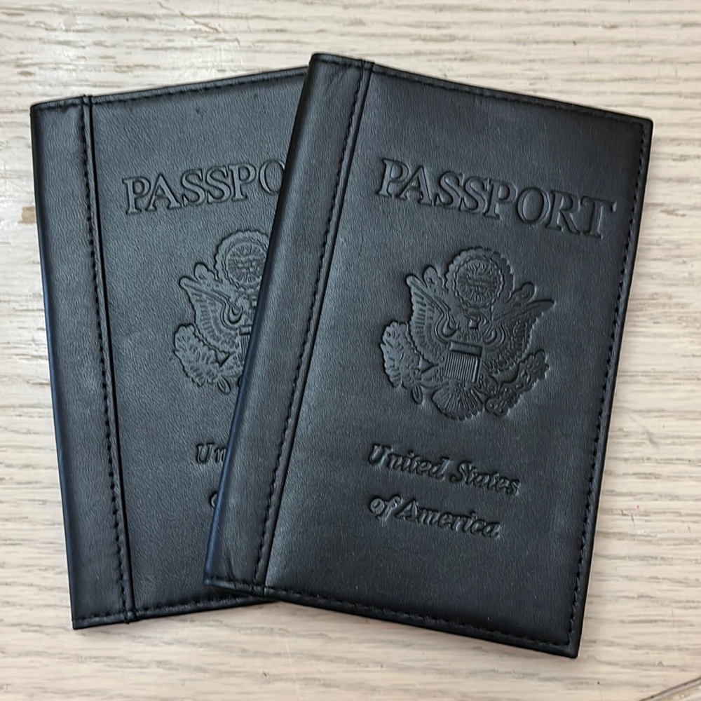 Passport holders- 2-black new. BUXTON BRAND.
